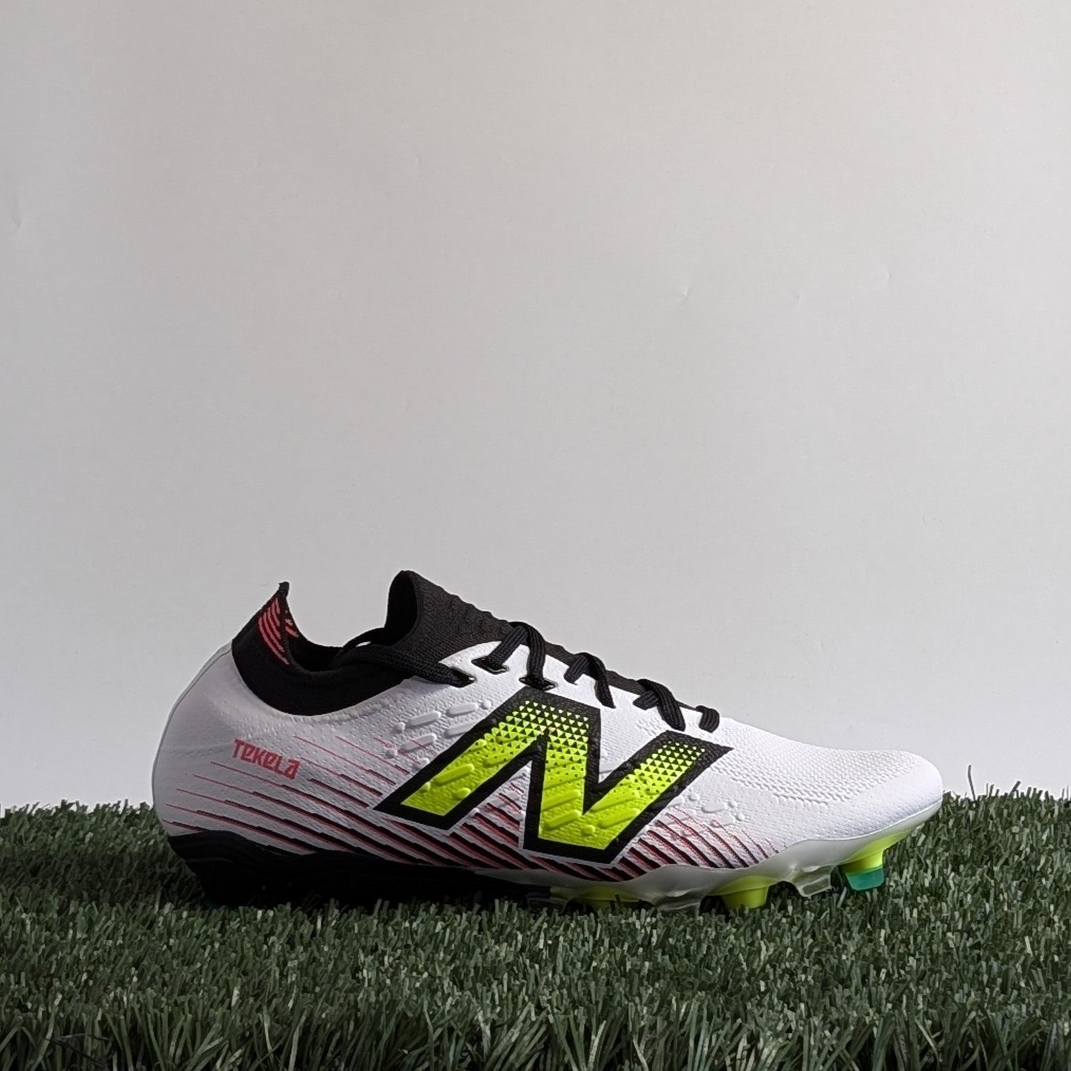 シューズ New Balance TEKELA 27.5 New Balance Tekela Pro Low Laced FG V4+ (D Medium) - ST1FLH45